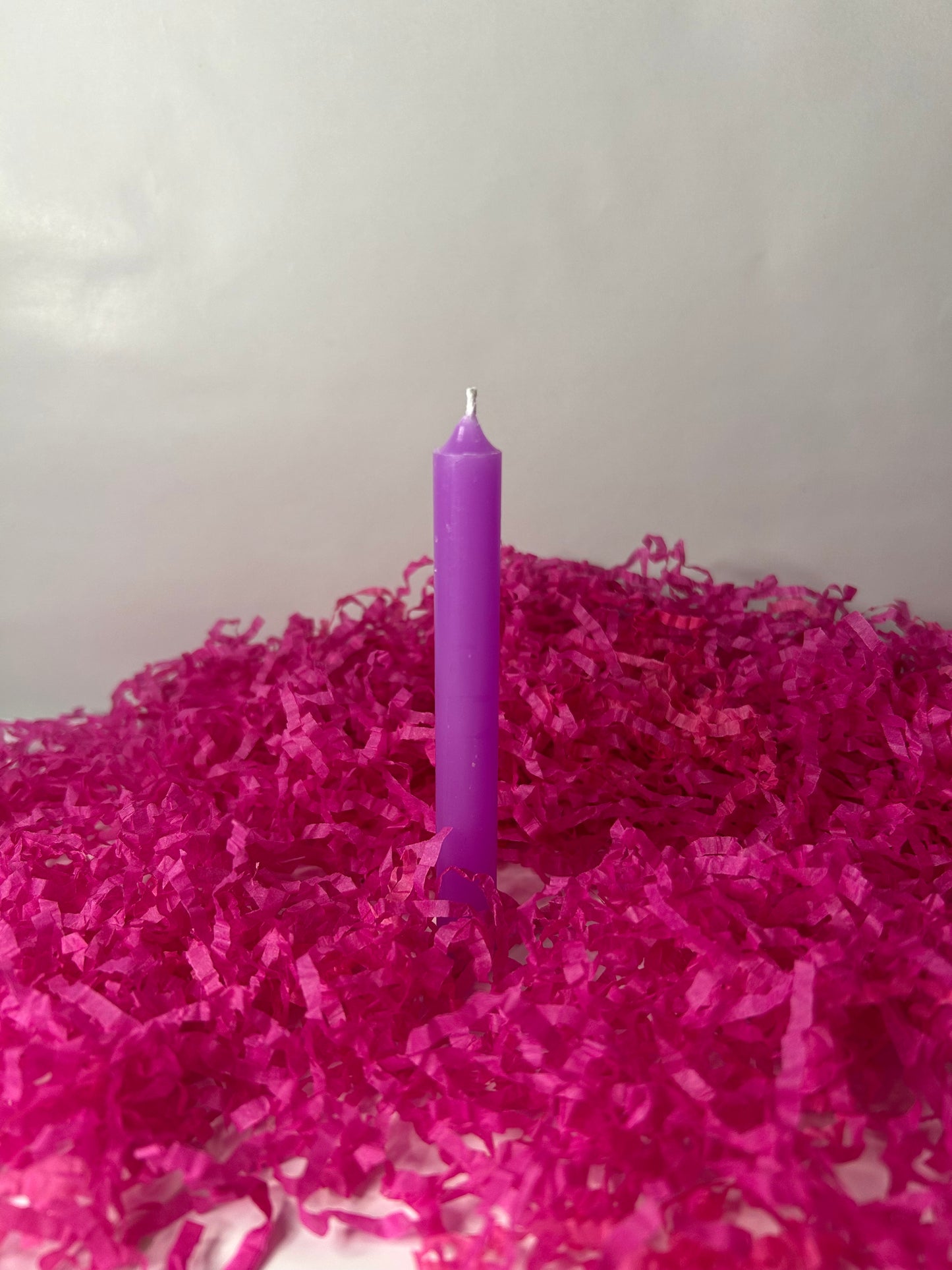 Vela pequeña púrpura.