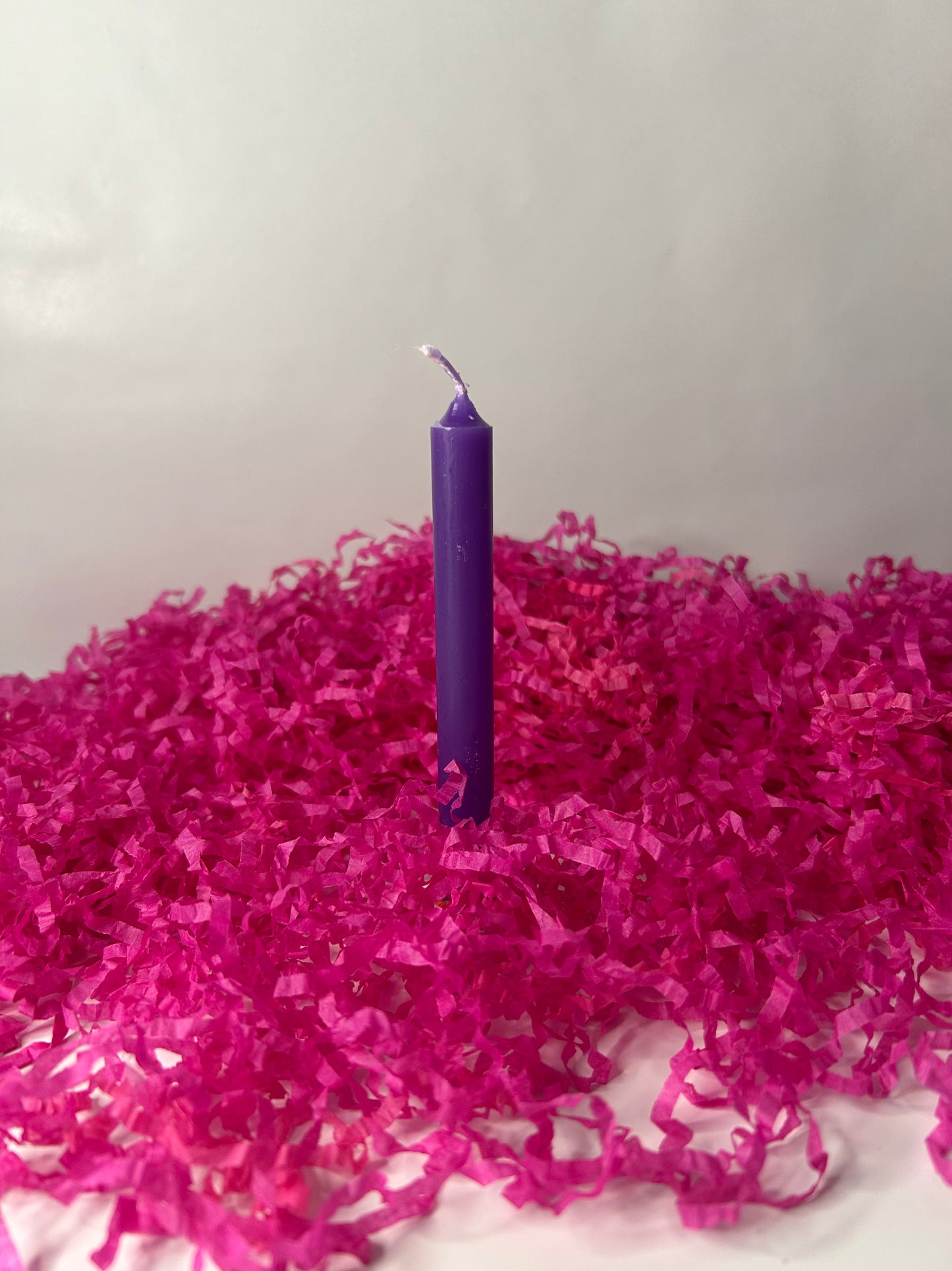 Vela pequeña morada.