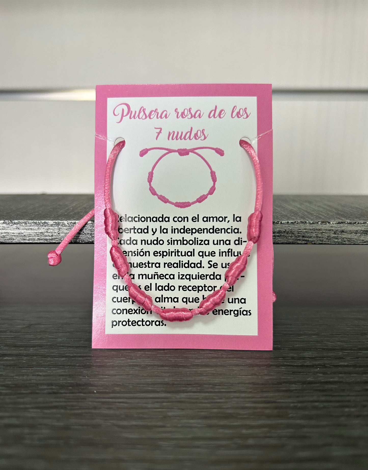 Pulsera 7 nudos rosa.