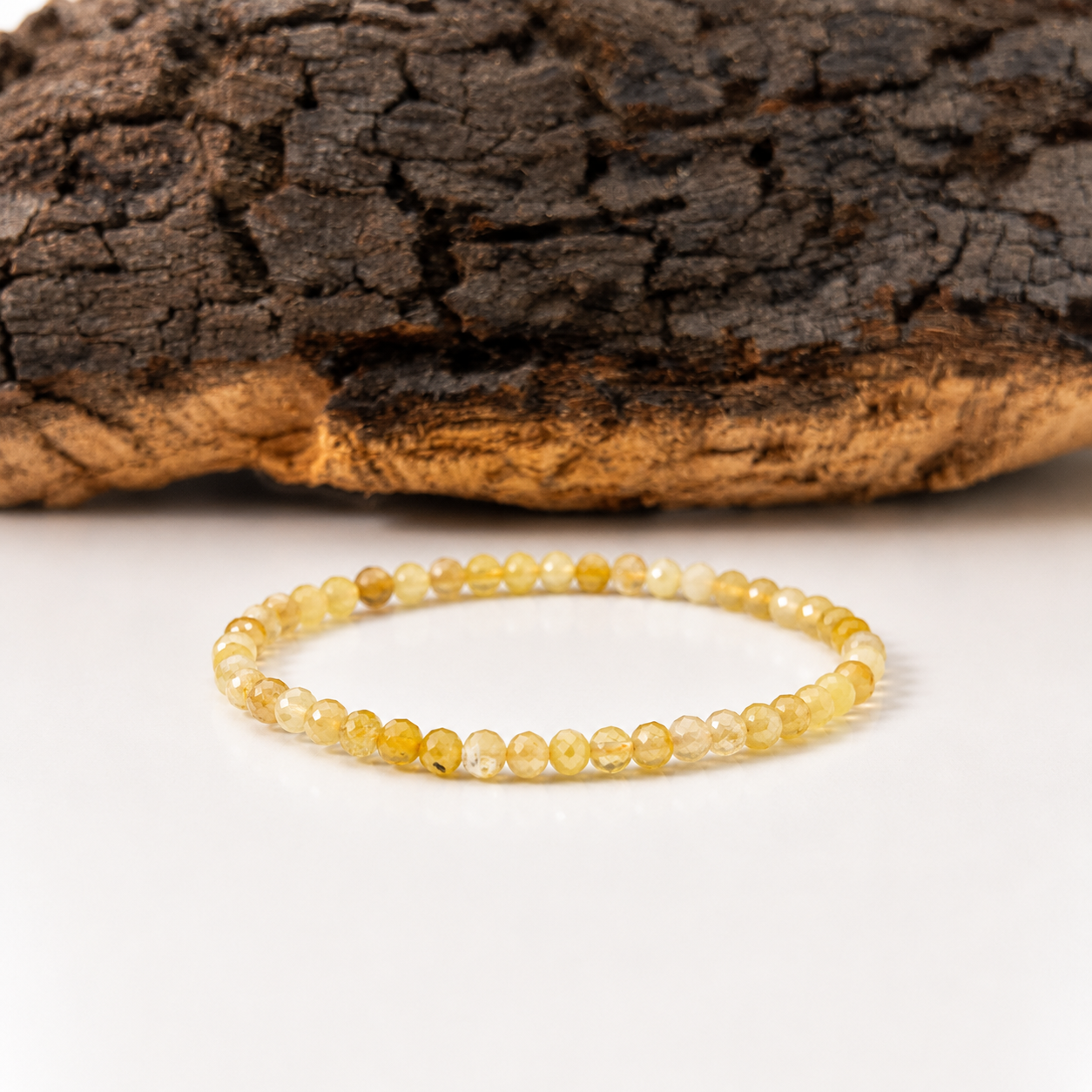 Pulsera elástica de ópalo amarillo facetado