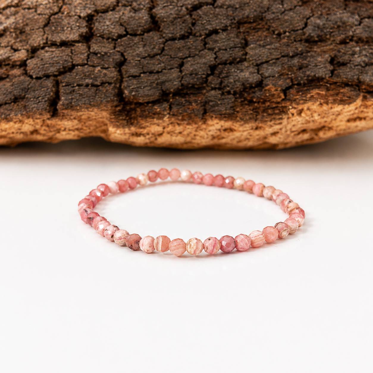 Pulsera elástica de rodocrosita facetada