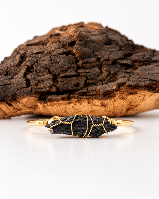 Escoba de bruja en brazalete