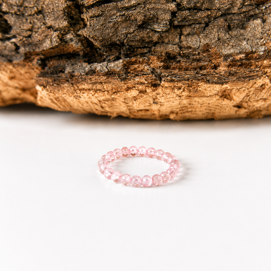 Anillo elástico de cuarzo rosa facetado
