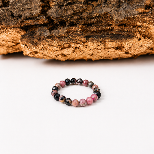 Anillo elástico de rodonita facetado