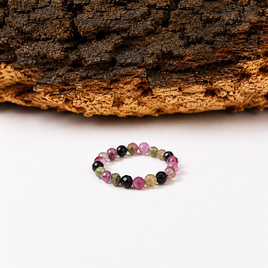 Anillo elástico de turmalina sandia facetada