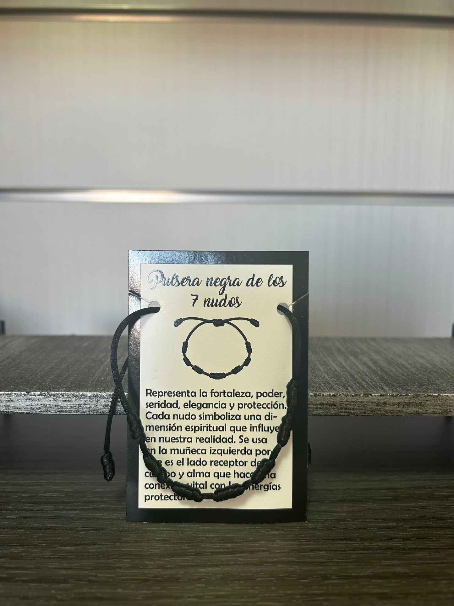 Pulsera 7 nudos negra.