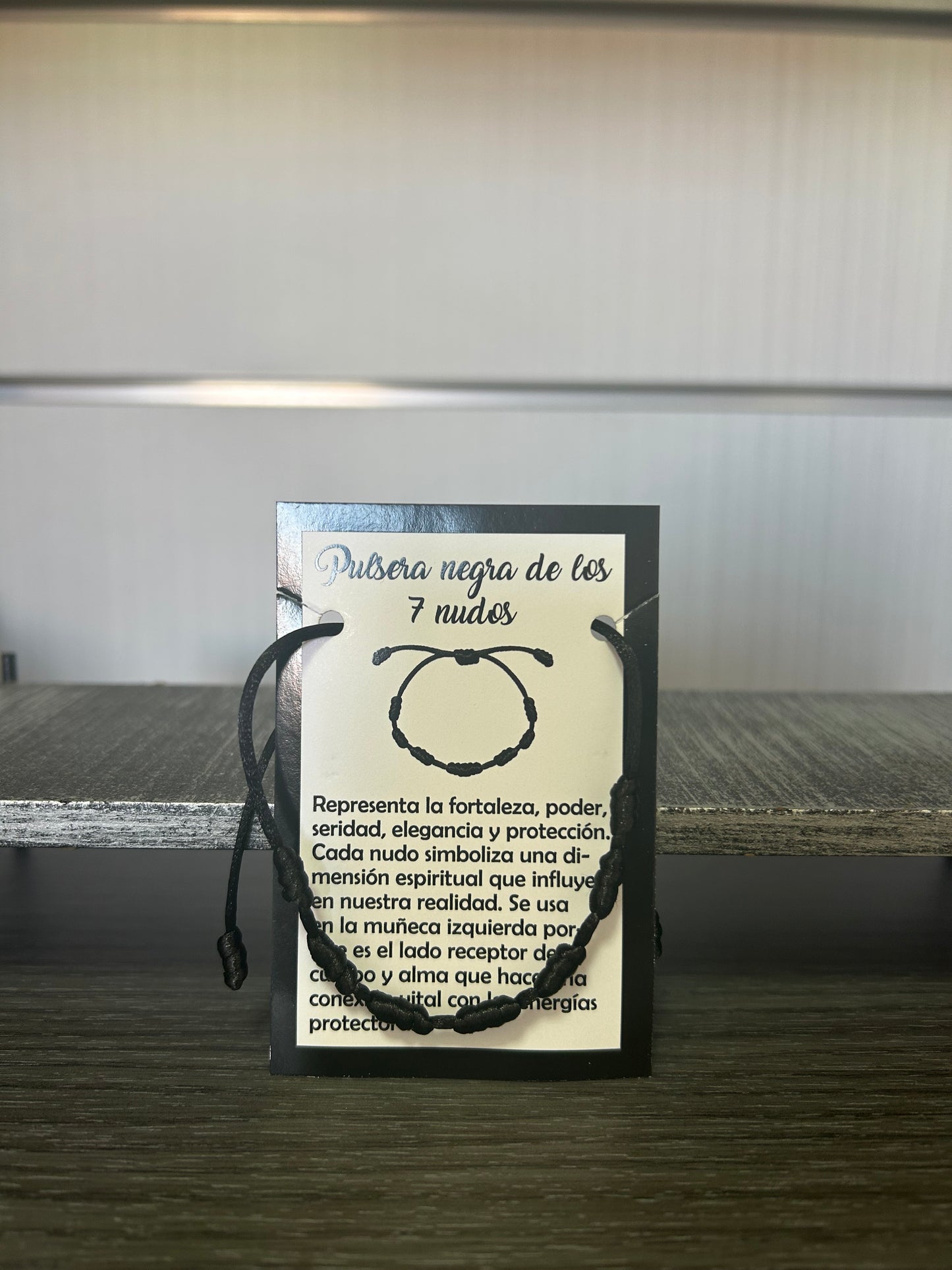Pulsera 7 nudos negra.