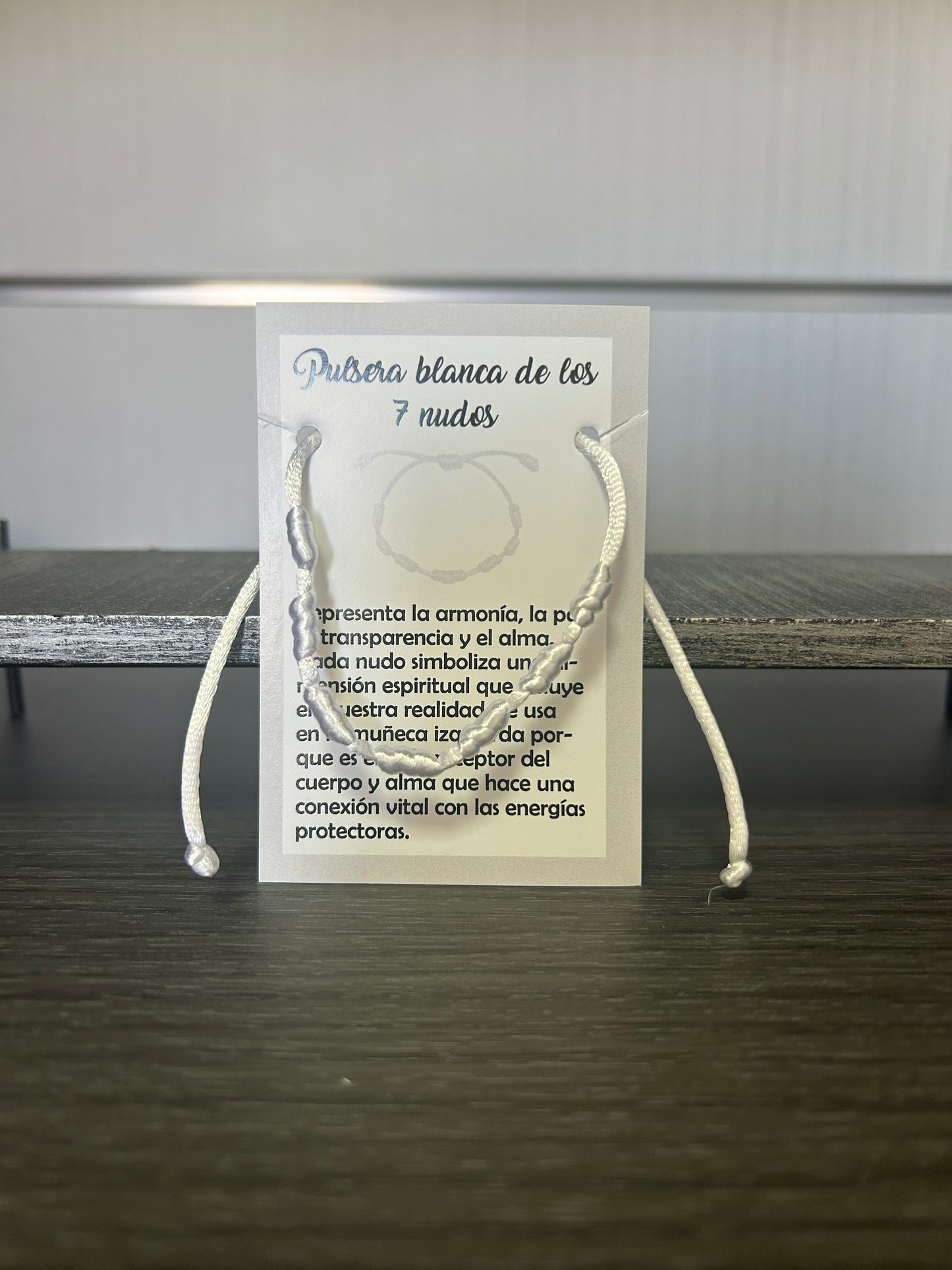 Pulsera 7 nudos blanca.