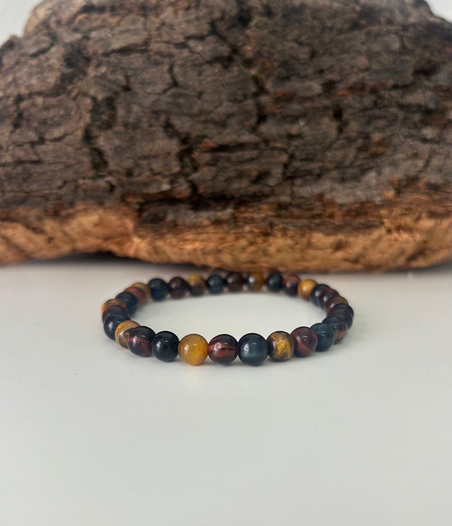 Pulsera triple ojo 6mm