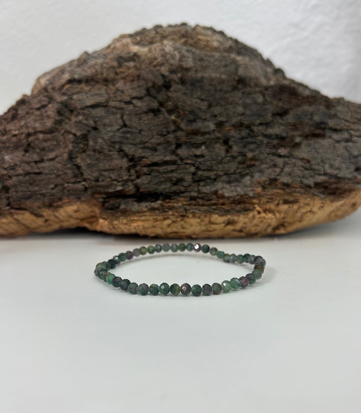 Pulsera zoisita facetada