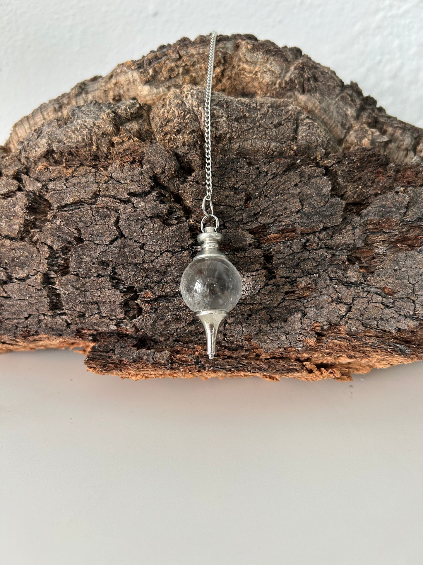 Péndulo de metal con cuarzo cristal